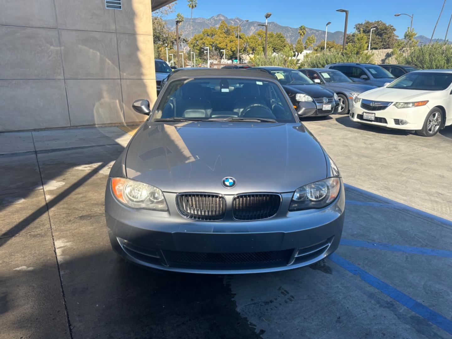 2011 Gray /Black BMW 1-Series 128i Convertible (WBAUN1C52BV) with an 3.0L L6 DOHC 24V engine, Automatic transmission, located at 30 S. Berkeley Avenue, Pasadena, CA, 91107, (626) 248-7567, 34.145447, -118.109398 - Low Miles!!! Elevate your driving experience with our 2011 BMW 1-Series 128i Convertible, now featured at our Buy Here Pay Here (BHPH) dealership in Pasadena, CA. Ideal for enthusiasts in Altadena CA, Glendale CA, Los Angeles CA, and throughout LA County, this stunning pre-owned convertible combine - Photo#7